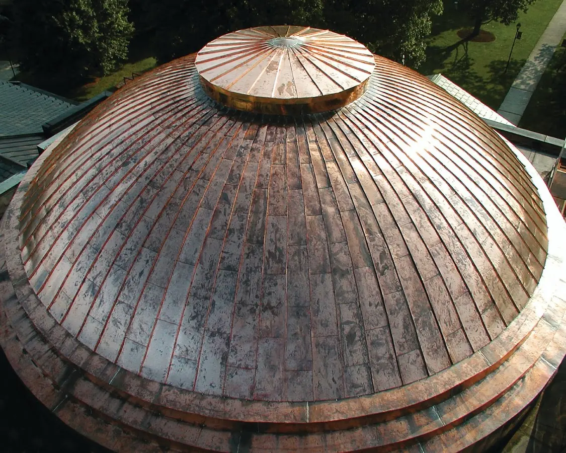 Craftsman Roofing crew installing a new roof in Washington Heights